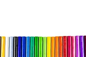 colorful plasticine sticks  clay on Isolated  background photo