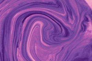Purple background from liquid and color combinations photo