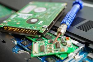 Repairing and upgrade circuit mainboard of notebook, electronic, computer hardware and technology concept. photo