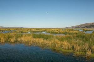 Lake Titicaca is the largest lake in South America and the highest navigable lake in the world. photo