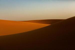 Beautiful sand dunes in the Sahara Desert in Morocco. Landscape in Africa in desert. photo