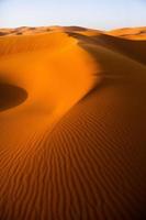 Beautiful sand dunes in the Sahara Desert in Morocco. Landscape in Africa in desert. photo