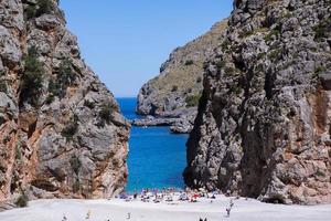 Beautiful beach with very clean and azure water on the mediterranean sea in the island of Ibiza, Spain photo