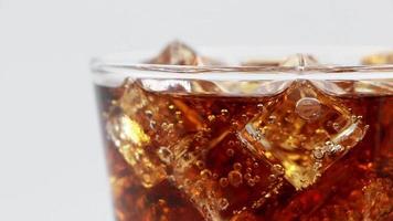 Cola with Ice in glass. Coke Soda closeup. video