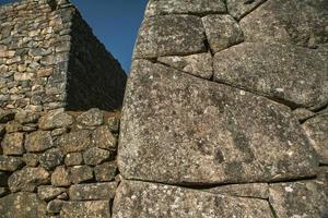 Wonder of the World Machu Picchu in Peru. Beautiful landscape in Andes Mountains with Incan sacred city ruins. photo