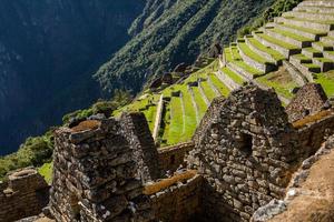 Wonder of the World Machu Picchu in Peru. Beautiful landscape in Andes Mountains with Incan sacred city ruins. photo