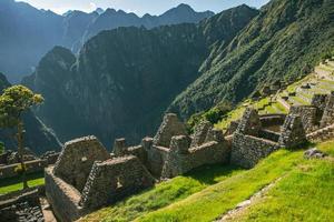 Wonder of the World Machu Picchu in Peru. Beautiful landscape in Andes Mountains with Incan sacred city ruins. photo