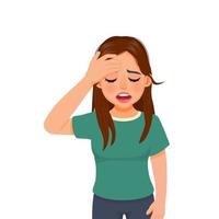 Depressed young woman holding her forehead feeling anxious, worried and disappointed about problems vector