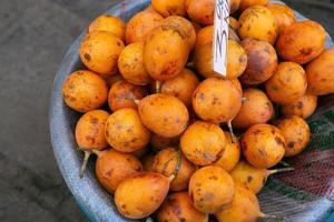Fresh fruits and vegetables at the local market in Lima, Peru. Market vegetables sold by local farmers. photo