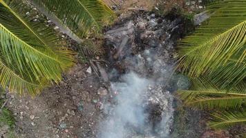 Aerial ascending open fire at rural agricultural video