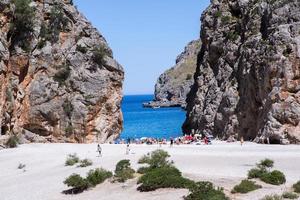 Beautiful beach with very clean and azure water on the mediterranean sea in the island of Ibiza, Spain photo