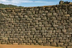 Wonder of the World Machu Picchu in Peru. Beautiful landscape in Andes Mountains with Incan sacred city ruins. photo