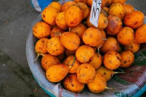 Fresh fruits and vegetables at the local market in Lima, Peru. Market vegetables sold by local farmers. photo