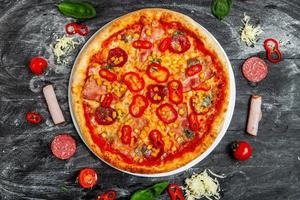 slices of pizza with different toppings on a wooden background. Delicious fresh pizza on white background. photo