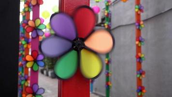 Colorful fan toy pinwheel spinning video