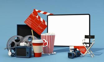 el concepto de ver películas en línea en casa durante la epidemia con pantalla de tableta para su contenido rodeado de boletos de cine, palomitas de maíz y bebidas con equipos de producción de películas en 3d foto