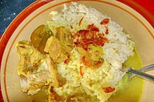 Goat curry with rice in plate photo