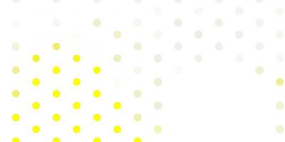 Light yellow vector backdrop with dots.