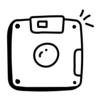 An icon of instant camera doodle vector