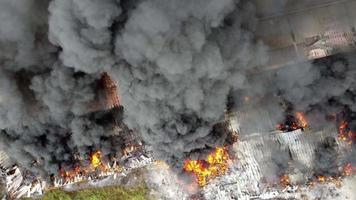 Aerial view fire burning industrial building video