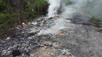 Environment air pollution due to open burning at dump site video