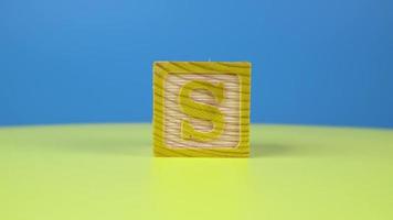 Close up shot letter S alphabet wooden block video