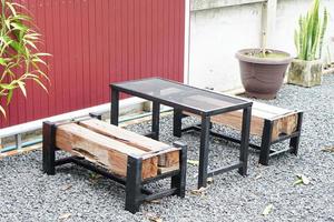 Table for sitting in the garden . Used for dining, reading. photo