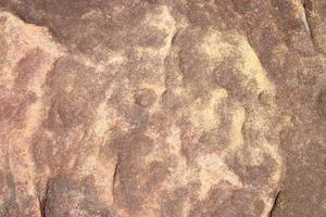 el fondo de piedra fue erosionado por el viento creando un hermoso patrón. fondo de mármol con texto foto