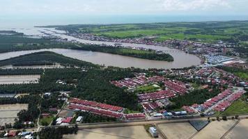 Aerial view establishing shot Sungai Kuala Kurau video