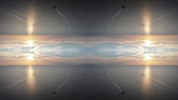 Symmetry effect of boat move at sea. Sky kaleidoscope effect