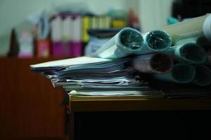 stack of papers on the desk photo