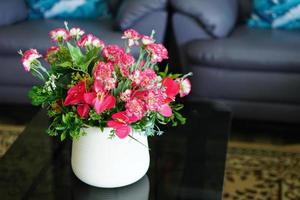 Roses in pots on the dining table photo