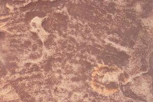 beautiful patterned stone floor was eroded by water and wind. photo