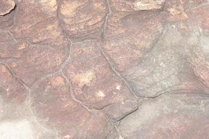 beautiful patterned stone floor was eroded by water and wind. photo