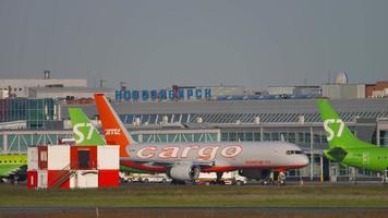 Airfreighter taxiing to runway for take off. video