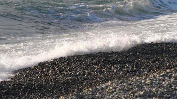 Sea waves rolling onto the pebble beach video