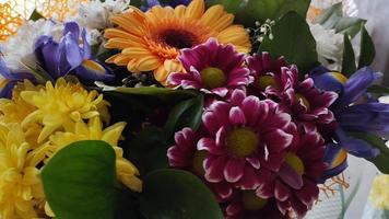 Flowers of different varieties are collected in a large bouquet video