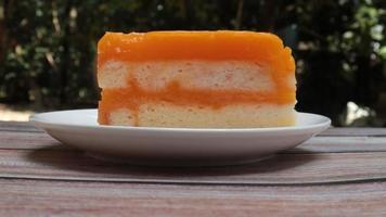 orange cheesecake on a plate video