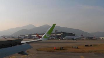 View from taxiing aircraft in Chek Lap Kok airport video