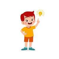 cute little kid boy show idea pose expression with light bulb sign vector