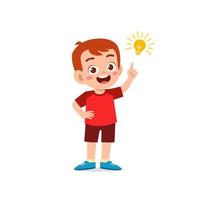 cute little kid boy show idea pose expression with light bulb sign vector