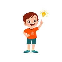 cute little kid boy show idea pose expression with light bulb sign vector