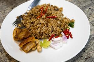 Fried rice with crispy pork of Thailand photo