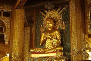 golden buddha in temple.Makha Bucha Day.Vesak Day.Asanha Bucha.Buddhist Lent. photo