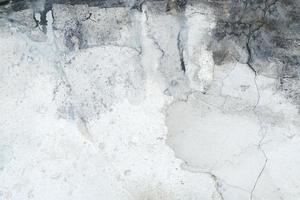 patrón de fondo pared de cemento.textura de fondo.viejo muro de hormigón en color blanco y negro foto