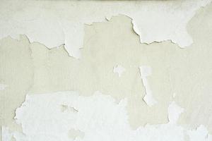 white cement wall background with discolored photo