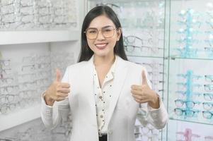 Portrait of ophthalmologist in optical center, eyecare concept. photo