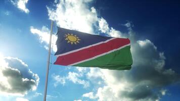 Flag of Namibia waving at wind against beautiful blue sky. 3d rendering photo