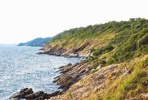 mountains and sea scenery with blue sky at koh smet, Thailand photo