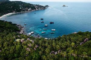 Bay and boats form above in island photo